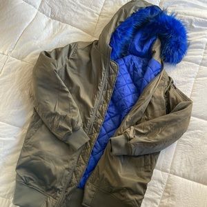 Green jacket with fuzzy blue hood size large